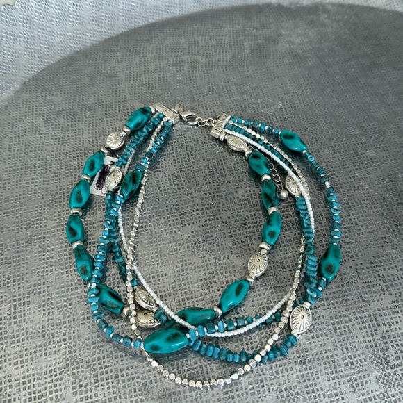 Chico turquoise / silver 5 strand necklace goes on collar bone. Never worn - Picture 1 of 3